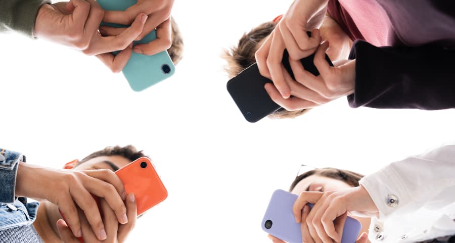 Teens using cell phones to access social media in Worcester